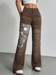 Jean évasé marron vintage à taille haute avec imprimé totem cœur blanc et délavé