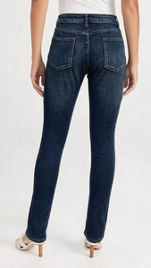 Rear view of slim fit high waist dark blue denim jeans with symmetric back pockets
