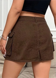 Detail view of the side pocket and fine corduroy texture on this brown cargo mini skirt