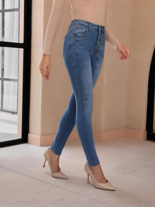 Women's high waist skinny jeans featuring five-button fly and stretchy fit in classic blue