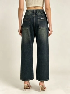 Deep blue high-waisted wide-leg denim jeans for women with vintage wash and back pocket detail