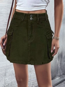 Detail of army green cargo denim mini skirt featuring high waist and double buttons