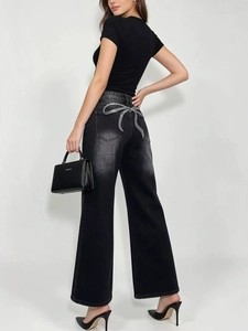 Jeans a gamba larga a vita alta grigio scuro con fiocco glitterato argento sulle tasche posteriori