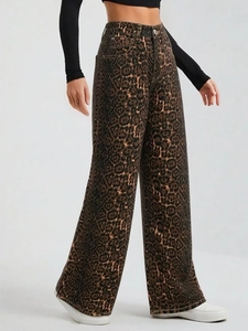 Detailed close-up of high-waist leopard print wide-leg jeans with five-pocket design