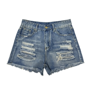 Short en jean bleu taille haute tendance avec déchirures usées et ourlet à franges