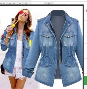 Detail of blue denim jacket showing zipper closure, flap pockets and drawstring waist
