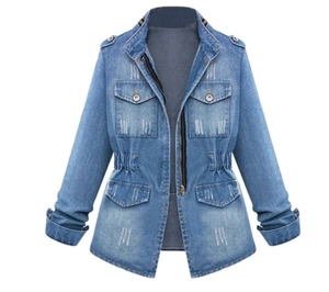 Detail of plus size denim top featuring a drawstring waist and functional zipper accents