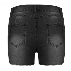 Detail view of high waist black denim shorts featuring back pockets and frayed raw hem edge