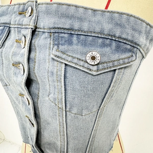 Fashionable light blue denim tube top with metal buttons and frayed hem detail