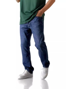 Men's relaxed fit denim jeans in dark blue wash, styled with casual sneakers