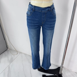 Detailed view of women's high waist blue denim pants with front vertical seam design
