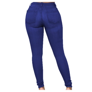 Close-up of slim fit high-waisted dark blue jeans with back pockets and denim texture