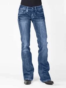 Women's vintage flared denim jeans in dark blue with whiskers and faded bootcut design