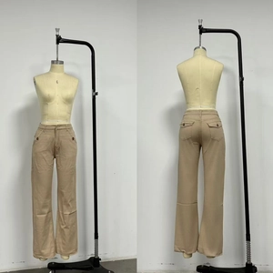 Front and back view of high-waisted khaki wide leg trousers with pocket details