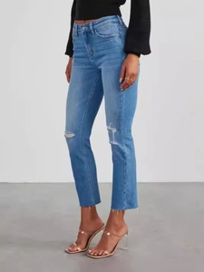 Fashion slim fit ripped blue denim jeans with raw hem and stylish frayed knee details