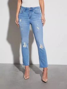 Jean skinny bleu clair à taille haute pour femme avec déchirures et ourlets effilochés