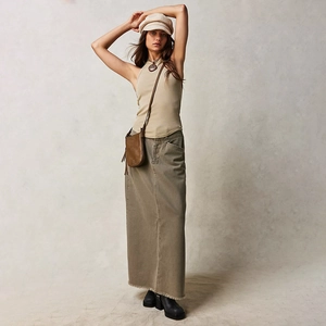 Fashionable army green high-waisted denim maxi skirt featuring raw hem and workwear style