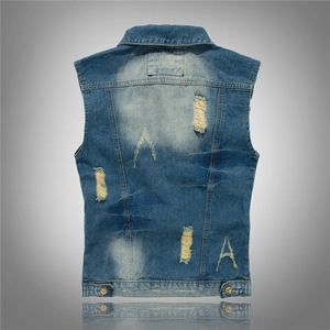 Men's vintage blue denim vest featuring heavy distressed rips and back washed finish