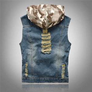 Rear view of distressed blue denim vest with camouflage hood and ripped detail