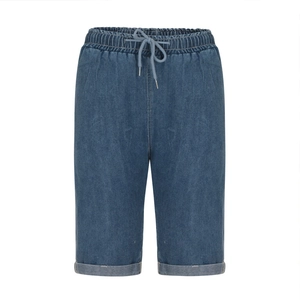 Deep blue washed denim shorts with elastic drawstring waist and rolled cuffs for women