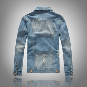 Back view of a men's light blue distressed denim jacket with retro washed ripped details