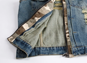 Slim fit denim vest for men featuring camouflage lining and distressed ripped details