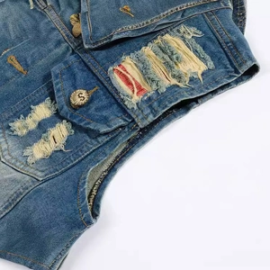Slim fit blue denim vest with distressed ripped details and vintage metal buttons