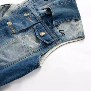 Vintage washed slim denim vest for men with embroidery details and distressed finish