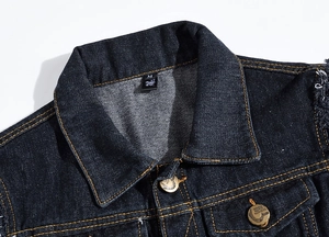 Close-up of slim fit black denim vest featuring fashion buttons and yellow stitching details
