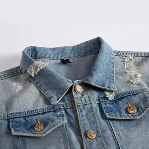 Men's light blue washed denim jacket with distressed details and vintage gold buttons