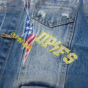 Slim fit denim vest for men featuring American flag embroidery and lightning patterns