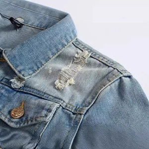 Slim fit light blue denim jacket with distressed details and anchor embossed buttons