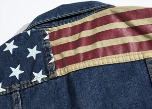 Detail of denim vest back featuring US flag stars and stripes printed panels