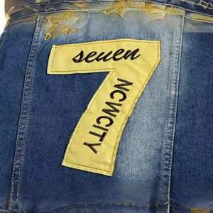 Slim fit denim vest for men with yellow embroidered number seven and NCWCITY text patch
