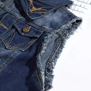 Slim fit denim vest with distressed frayed edges and heart-shaped metal buttons