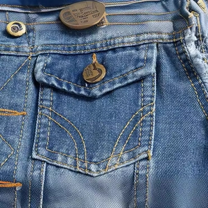 Slim fit light blue denim vest for men featuring flap pocket and distressed fringe edges