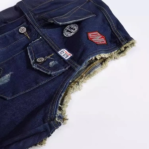Slim fit blue denim vest for men with patchwork patches and warm faux fur lining detail