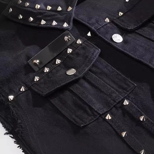 Men's black denim punk vest featuring silver metallic studs and frayed edge detailing