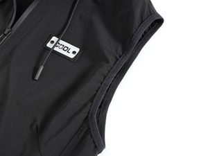 Detail of hooded black vest with zip closure and COOL patch on water-resistant fabric