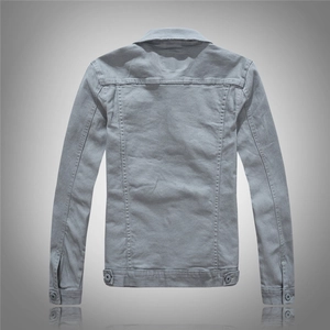 Rear view of a light gray denim jacket showing back yoke and adjustable waist buttons