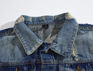 Men's blue washed denim vest with lightning embroidery and vintage distressed collar detail
