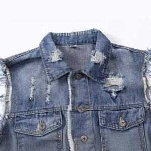 Men's light blue distressed denim vest with frayed edges and vintage washed finish
