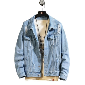 Men's light blue distressed denim jacket with ripped details and classic vintage wash