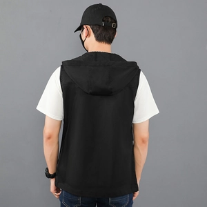 Rear view detail of a black slim-fit hooded sports vest layered over a white t-shirt