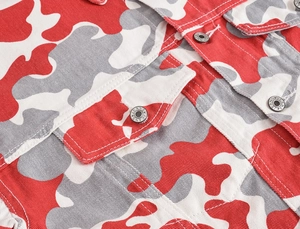 Detail of red camouflage denim jacket with white topstitching and metal jeans button