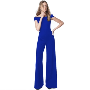Detail of royal blue off-shoulder jumpsuit with elegant fold-over neckline and wide leg cut