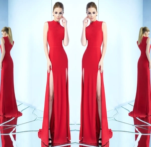 Detail view of red slim fit sleeveless evening gown with high side slits and stand collar
