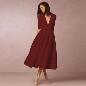 Detail of elegant V-neckline and waist tie on the dark red medium-sleeve evening gown
