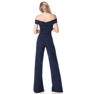 Rear view of elegant navy blue off-shoulder jumpsuit with back zipper and wide legs