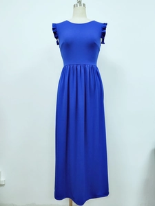 Close-up of royal blue evening dress featuring a round neck and tiered ruffle sleeves
